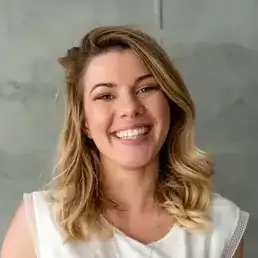 Woman with ipad smiling